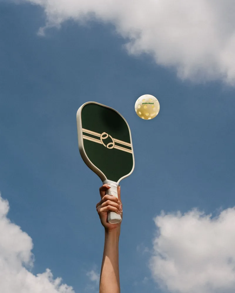 Paddle raised against the sky
